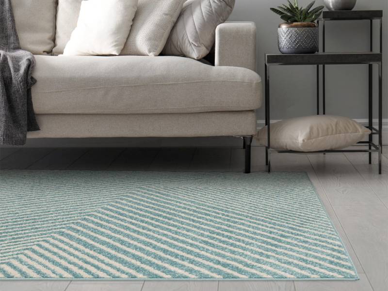 Muse blue cross rug in a living room
