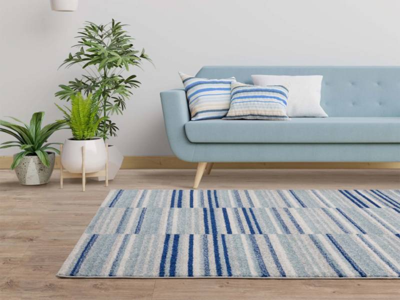 Muse Blue Stripe rug in a living room