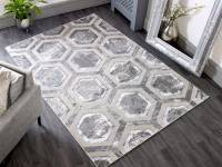 Aurora crystal metallic silver rug in a room