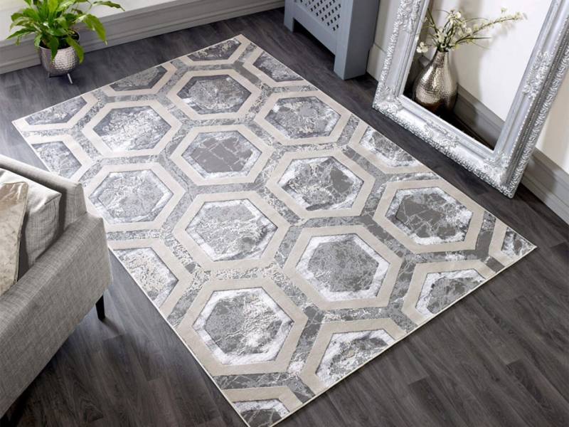 Aurora crystal metallic silver rug in a room