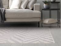 Muse grey chevron rug in a living room