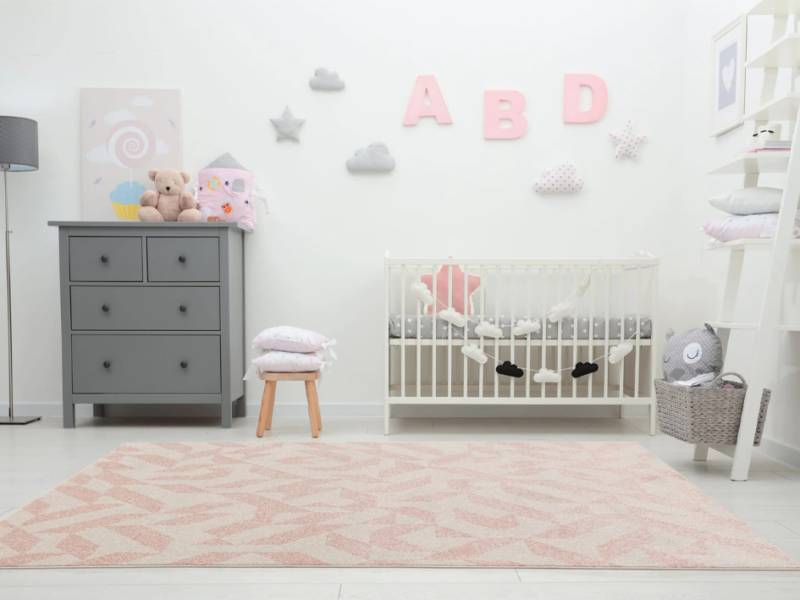 Muse pink shapes rug in a baby room