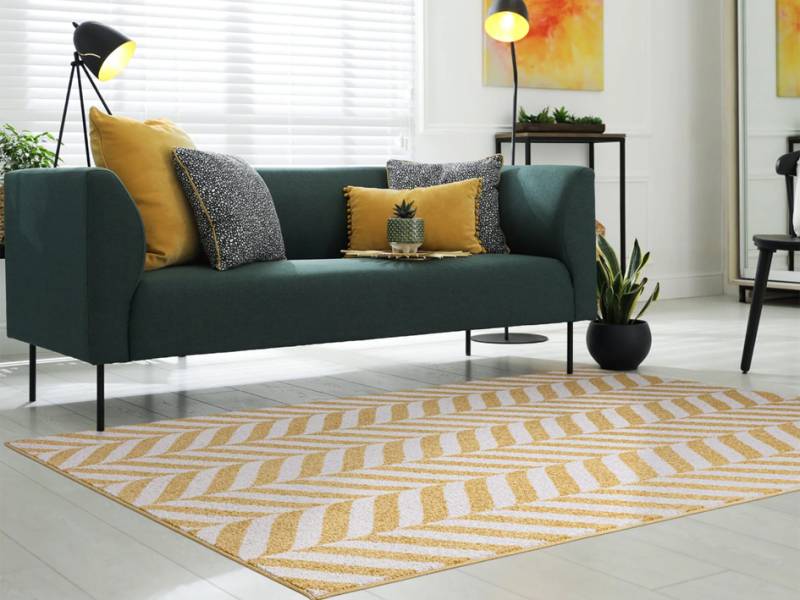 Muse yellow chevron rug in a living room