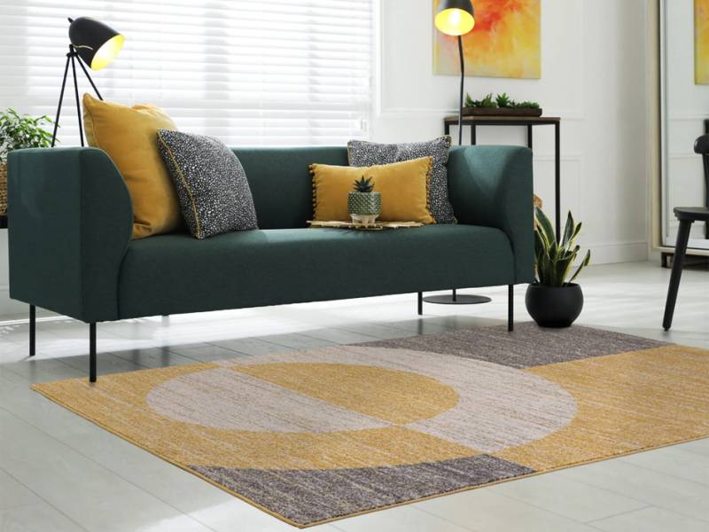 Muse yellow halo rug in a living room