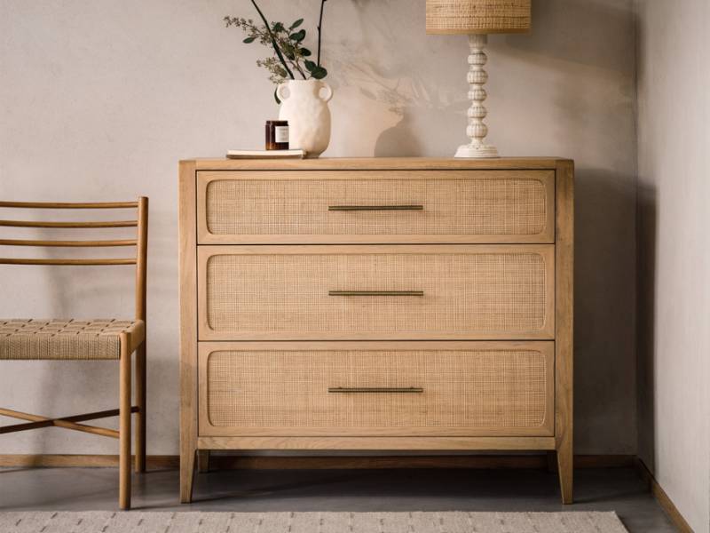 Coco chest of drawers in a room with decorations on it