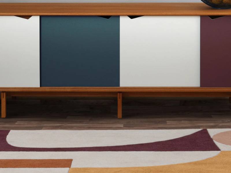 Reef rug in a room with a cabinet