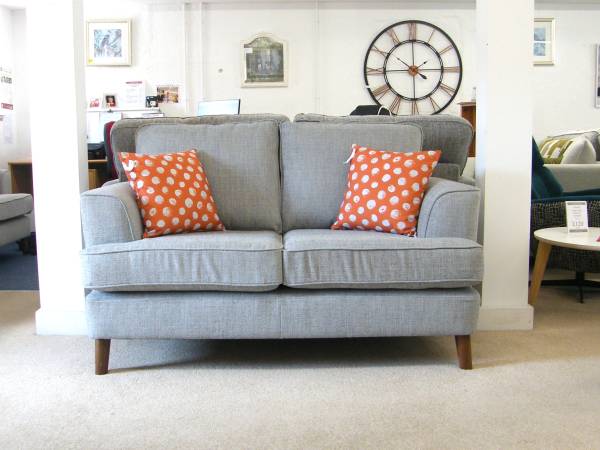 Copenhagen sofa with orange dotted pillows