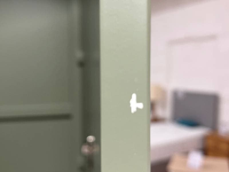 paint chip on inside of wardrobe door